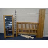 A LIGHT OAK 4' 6'' BEDFRAME, with side rails and slats, together with an oak full length mirror,