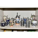 A COLLECTION OF TWELVE METAL, GLASS AND CERAMIC BEER STEINS, all second half 20th Century,