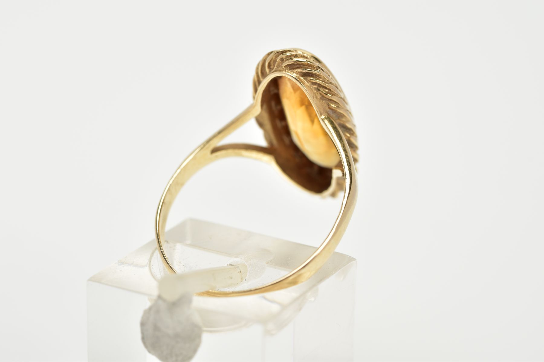 A 9CT GOLD CITRINE RING, designed with an oval cut citrine, within a collet mount and rope twist - Image 3 of 3