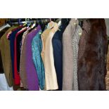 A COLLECTION OF LADIES CLOTHES, including dresses, two piece suits, coats, a coney fur three quarter