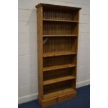 A MODERN PINE OPEN BOOKCASE, width 94cm x depth 31cm x height 205cm