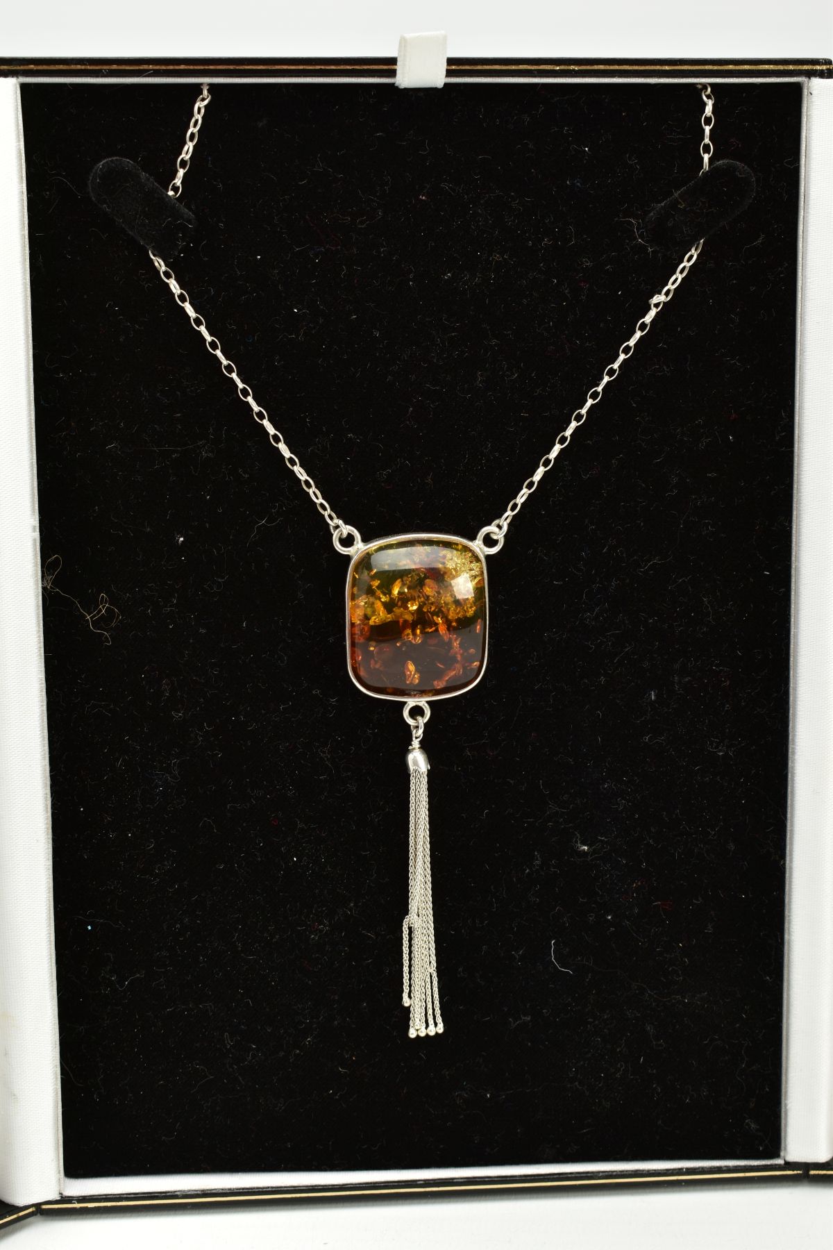 A CASED WHITE METAL AMBER PENDANT NECKLACE, the fitted pendant of square form, set with a square - Image 4 of 5