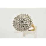 A 9CT GOLD DIAMOND CLUSTER RING, the tiered cluster ring set with single cut diamonds,