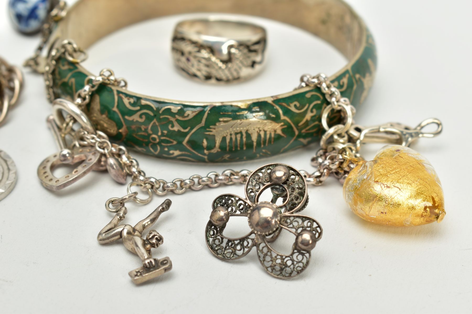 A SELECTION OF JEWELLERY, to include a silver charm bracelet, suspending four white metal charms - Image 3 of 4