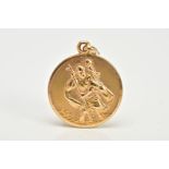A YELLOW METAL CIRCULAR ST CHRISTOPHER PENDANT, stamped 375, approximate weight 5.4 grams