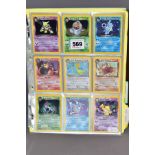 A COMPLETE SET OF POKEMON TEAM ROCKET CARDS, including the 'Secret' Dark Raichu card (83/82), with a