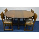 AN OLD CHARM OAK CIRCULAR EXTENDING PEDESTAL DINING TABLE, extended length 152.5cm x diameter