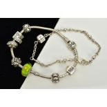 A PANDORA CHARM BRACELET WITH CHARMS AND ONE OTHER, the snake chain bracelet fitted with seven