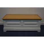 A MODERN LIGHT OAK AND CREAM PAINTED BLANKET CHEST, width 144cm x depth 65cm x height 55cm (s.d)