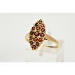 A 9CT GOLD GARNET RING, of a lozenge design set with fifteen circular cut garnets, plain polished