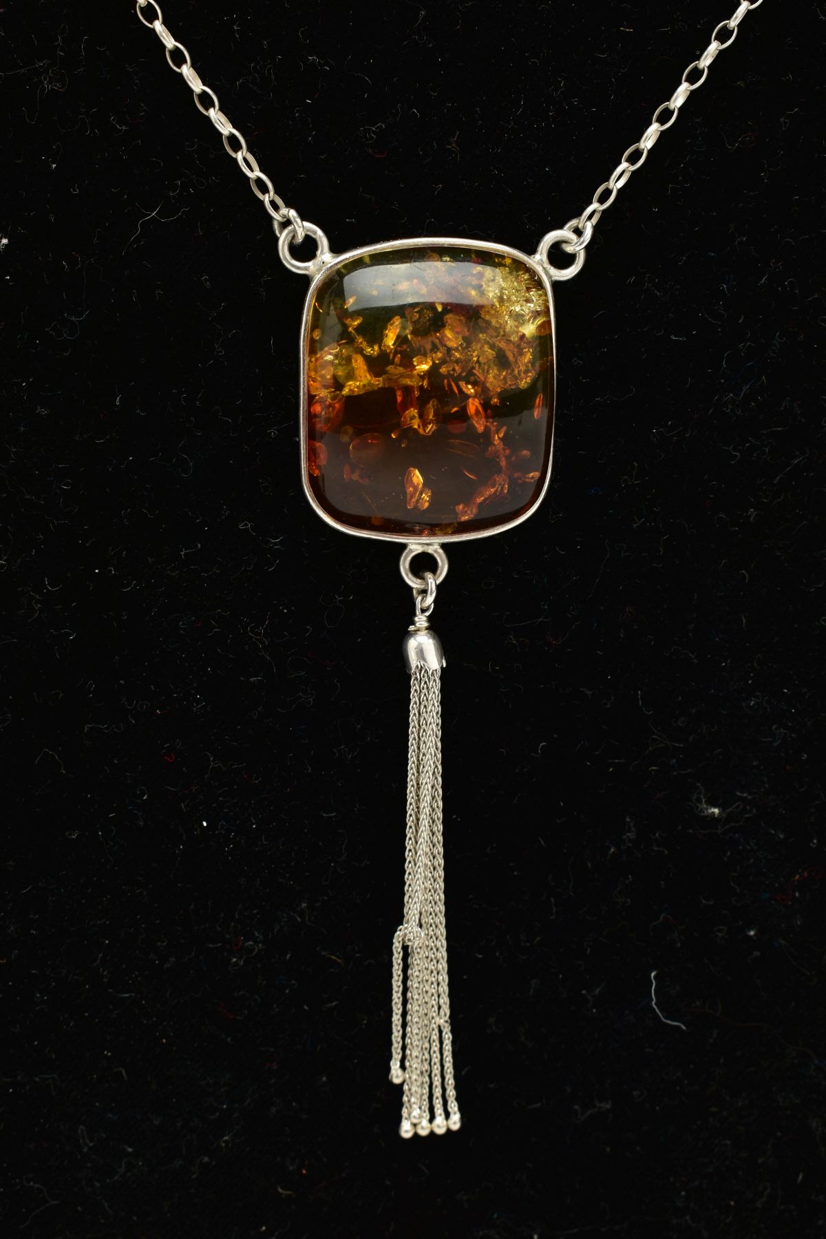 A CASED WHITE METAL AMBER PENDANT NECKLACE, the fitted pendant of square form, set with a square - Image 5 of 5