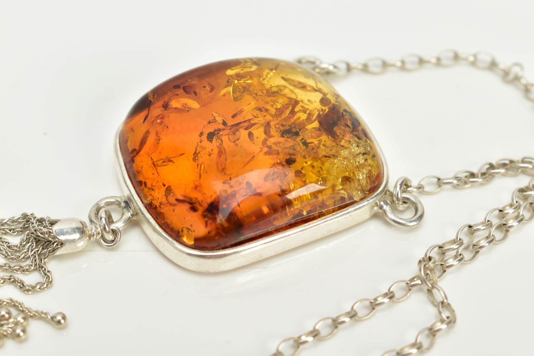 A CASED WHITE METAL AMBER PENDANT NECKLACE, the fitted pendant of square form, set with a square - Image 3 of 5