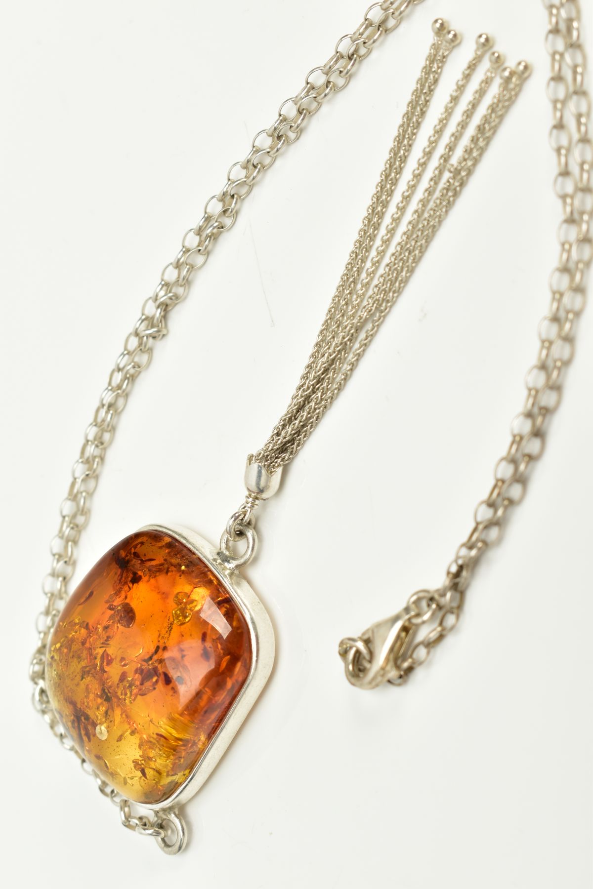 A CASED WHITE METAL AMBER PENDANT NECKLACE, the fitted pendant of square form, set with a square - Image 2 of 5