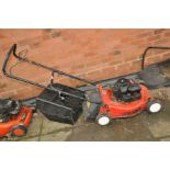 A SOVEREIGN PETROL LAWN MOWER with grass box (engine pulls freely but hasn't been started)