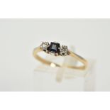 A THREE STONE SAPPHIRE AND DIAMOND RING, the yellow metal ring set with a central square cut
