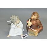 A BESWICK CHIMPANZEE WITH PIPE, No 1049, together with a Lladro 'Angel Thinking' No 4539 designed by