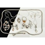 A COLLECTION OF WHITE METAL ASSORTED JEWELLERY ITEMS to include an orange crystal and cubic zirconia