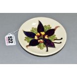 A MOORCROFT POTTERY CIRCULAR PIN DISH, 'Columbine' pattern on cream ground, impressed marks to base,