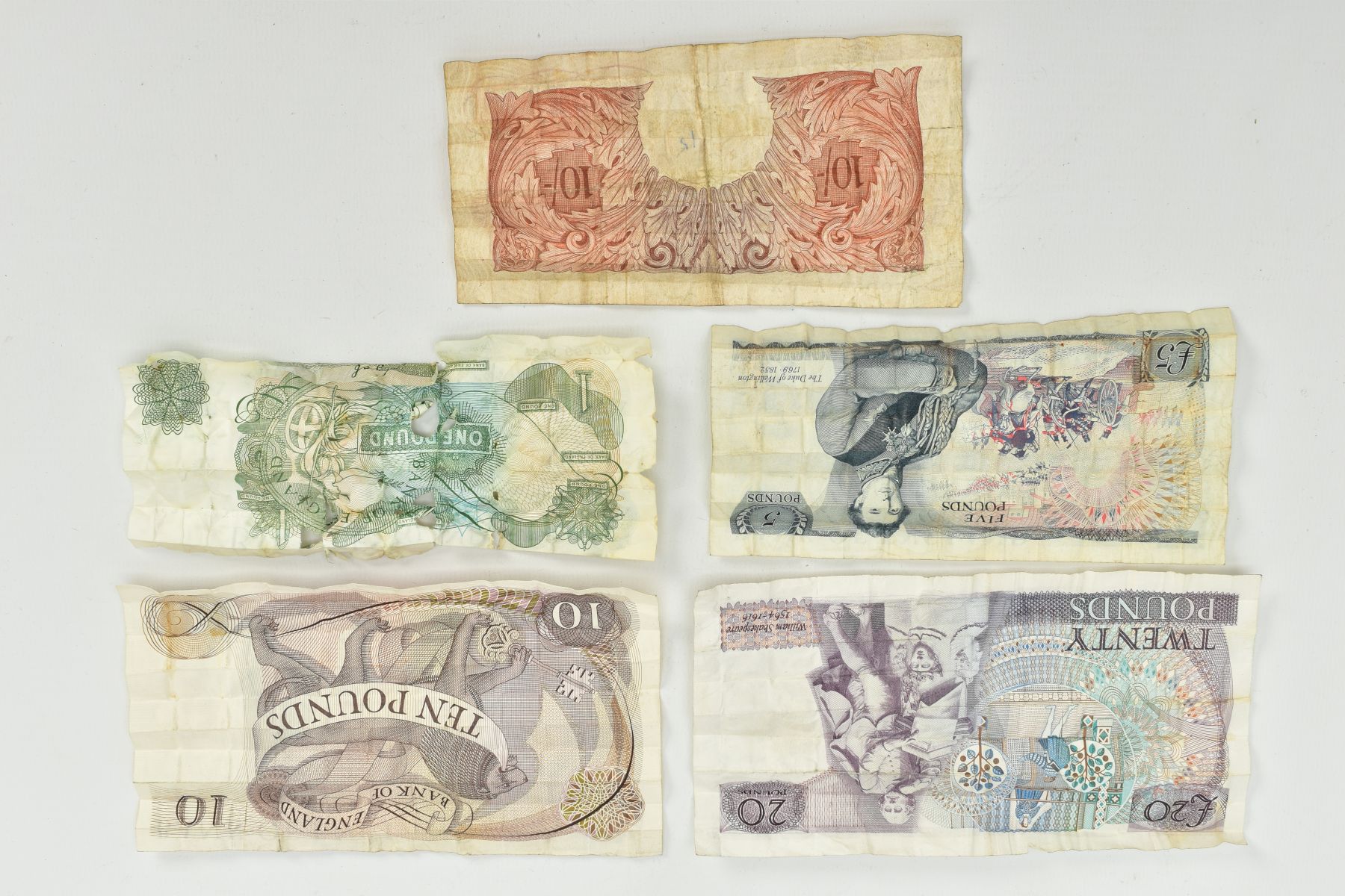 A SMALL QUANTITY OF OLD BANK NOTES, to include a one pound note, ten shillings, five pounds, ten - Image 2 of 2