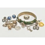 A SELECTION OF JEWELLERY, to include a silver charm bracelet, suspending four white metal charms