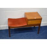 A CHIPPY HEATH TEAK TELEPHONE TABLE/SEAT