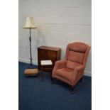 A HSL PINK UPHOLSTERED WING BACK ARMCHAIR, mahogany two door cabinet, wrought iron standard lamp and
