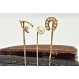 THREE YELLOW METAL PEARL DETAILED STICK PINS, the first designed with a single cultured pearl,