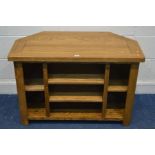 A GOLDEN OAK CORNER TV STAND, width 97cm x depth 50cm