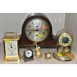 AN OAK CASED CHIMING MANTEL CLOCK, chimes but only runs for a few seconds, together with a quartz