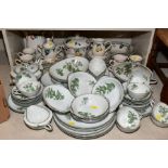 A NORITAKE CHINA DINNER SERVICE, decorated with trees and mountains, varying amounts, primarily