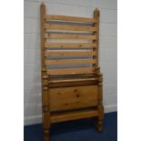 A PINE FRAMED SINGLE BED FRAME