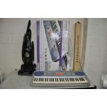 A YAMAHA PSR 275 KEYBOARD in original box and PSU, a folding stand and a Morphy Richards