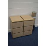 A PAIR OF MODERN BEECH THREE DRAWER BEDSIDE UNITS, and two rolled up rugs (3)