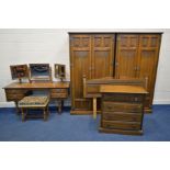 AN OLD CHARM OAK SIX PIECE BEDROOM SUITE, comprising two matching double door wardrobes, width 103cm