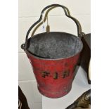 A GALVANISED FIRE BUCKET, red painted exterior with gold shaded lettering, worn condition with paint