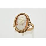 1 9CT GOLD CAMEO RING, of oval design depicting a lady in profile, within a collet mount and rope