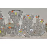 A QUANTITY OF CUT GLASS BOWLS, VASES, DECANTERS, ETC, to include Georgian crystal, a ship's decanter