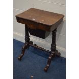 A LATE VICTORIAN WALNUT AND MARQUETRY INLAID WORK TABLE, the top enclosing fitted compartments, on