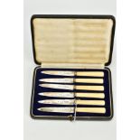 A CASED SET OF SIX FRUIT KNIVES, each silver blade, hallmarked London 1935 J.W.B.Ltd, fitted to