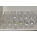 A QUANTITY OF CUT GLASS ETC, to include a set of wines, brandy, sherries and tumblers, all etched
