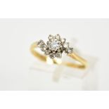 AN 18CT GOLD CROSSOVER DIAMOND RING, designed with central claw set round brilliant cut diamond,