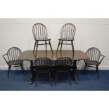 A DARK ERCOL REFECTORY TABLE, length 183cm x depth 88cm x height 73cm and a set of six Windsor