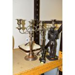 A PAIR OF SILVER PLATED THREE LIGHT CANDELABRA, polished through to the copper in places,