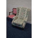 A PARKER KNOLL FLORAL UPHOLSTERED WING BACK ARMCHAIR, together with an Italian open armchair (the