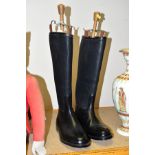 A PAIR OF J.C.CORDING & CO BLACK LEATHER AND RUBBERISED HUNTING BOOTS, leather soles with metal