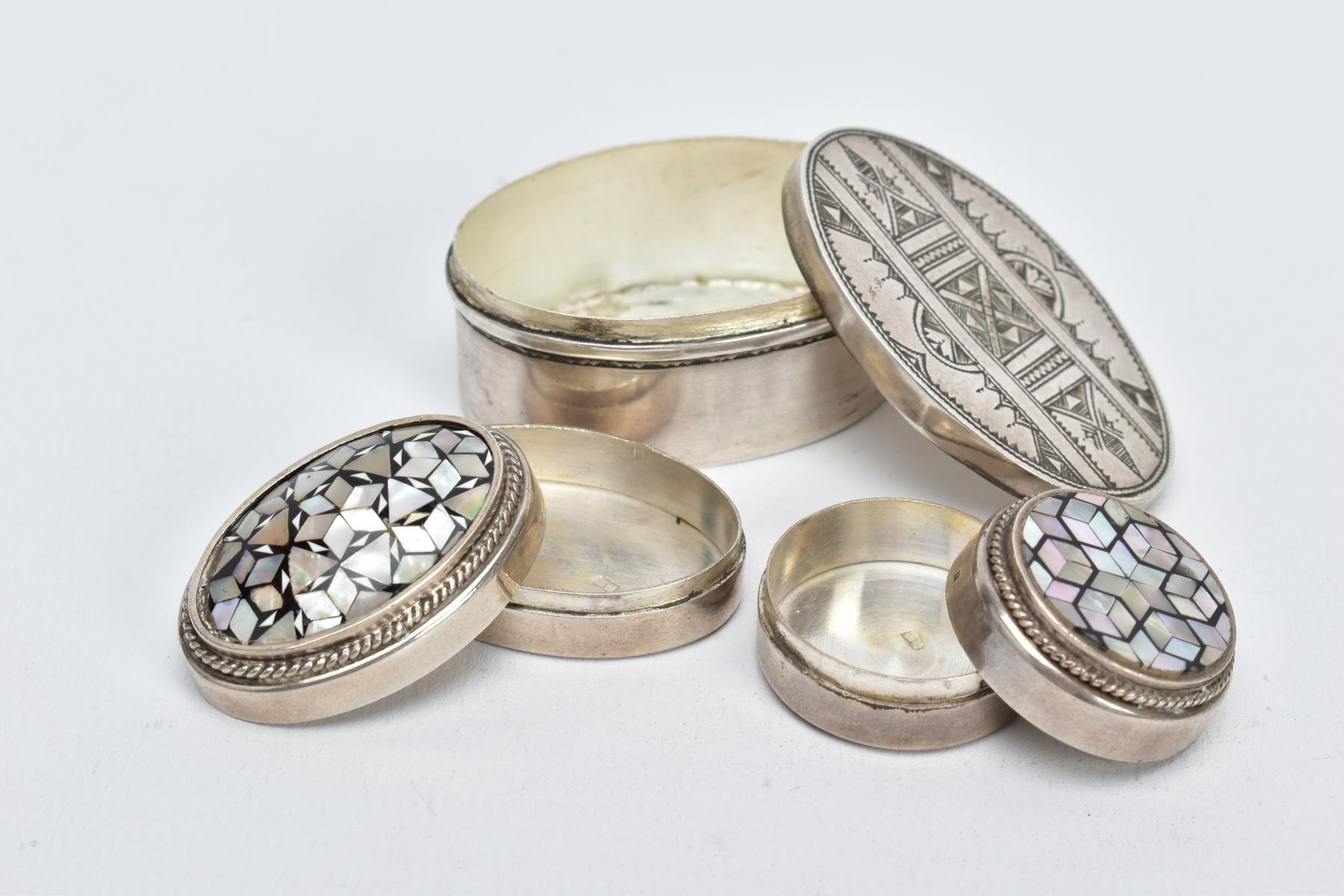 TWO EGYPTIAN SILVER PILL BOXES AND A WHITE METAL TRINKET BOX, two pill boxes of a circular and - Image 3 of 3