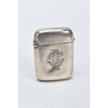 A SILVER VESTA, plain polished design with an engraved monogram to the front, striker to the base,