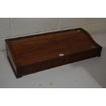 A VICTORIAN FLAME MAHOGANY RECTANGULAR SLOPPED TABLE TOP STORAGE BOX, width 72cm