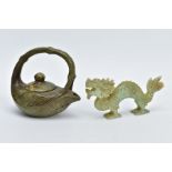 TWO ORIENTAL CARVED HARDSTONE ITEMS, to include a carved teapot with a carved bamboo style handle