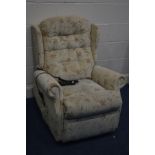 A CELEBRITY FLORAL UPHOLSTERED ELECTRIC RISE AND RECLINE ARMCHAIR (PAT pass and working)